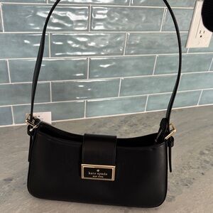 Kate Spade Black Shoulder Bag with Gold Accents